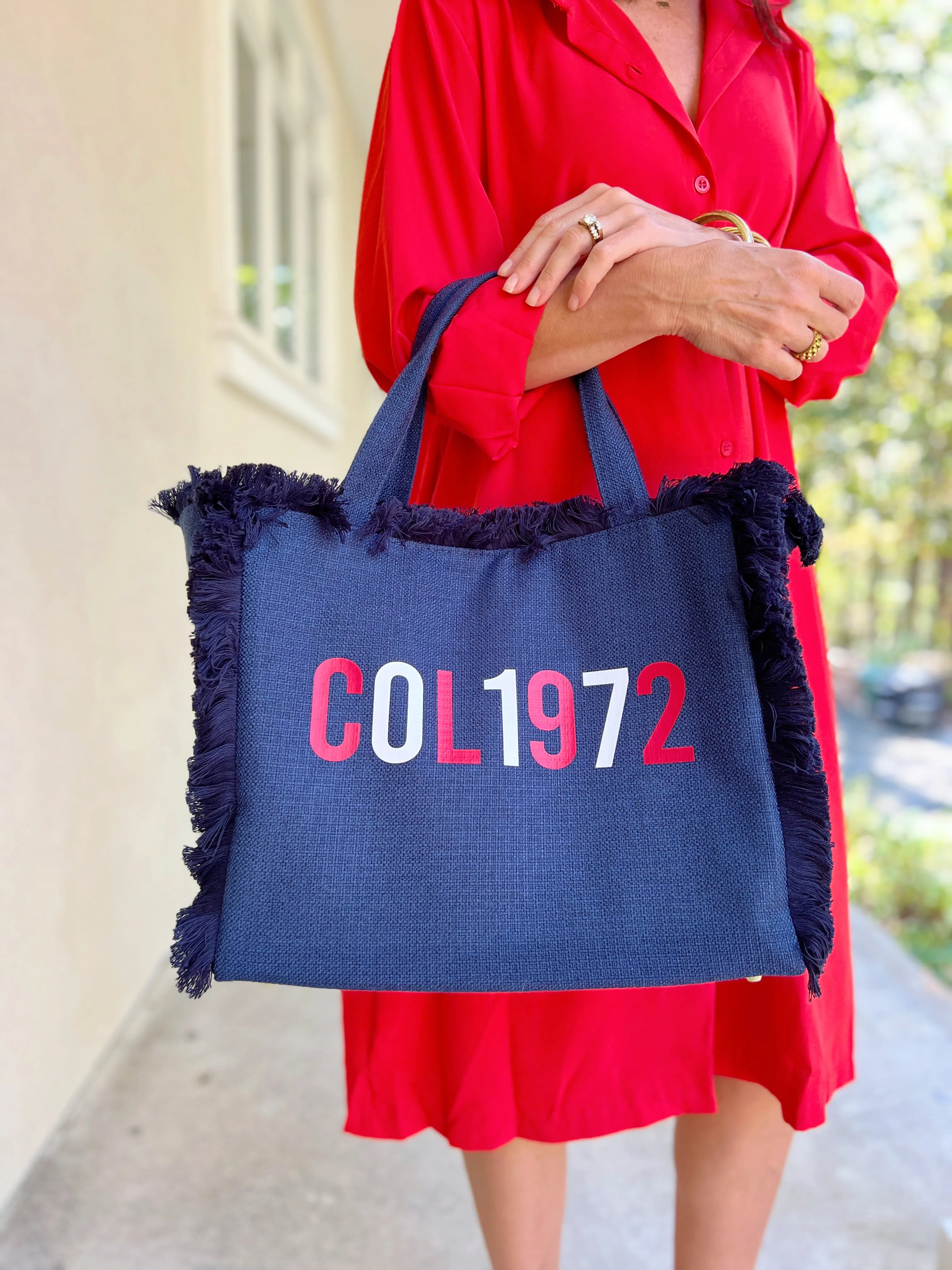 COL1972 Fringe Navy Purse